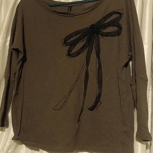 Ribbon adorned shirt with sheer black ribbon bow